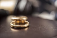 Wedding rings on a table during uncontested divorce